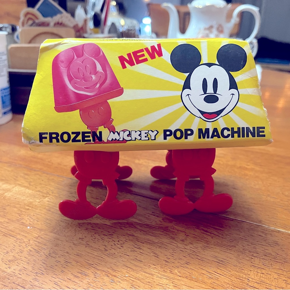 Vintage Mickey Mouse Frozen Mickey Pop Cycle Machine.  New. Very rare Red Feet